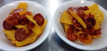 Add cheese [and chorizo] and grill or bake until the cheese melts